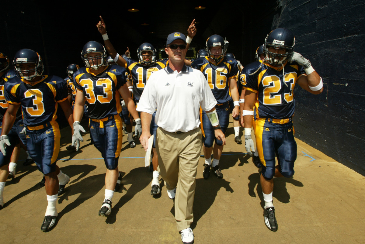 Jeff Tedford leads his team out before his first game as Cal's head coach. Photo courtesy of Cal Athletics