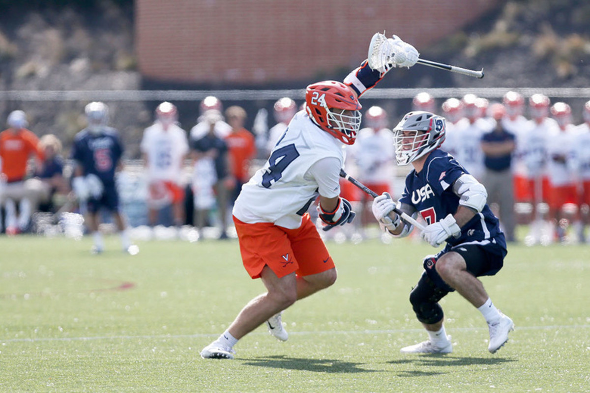 Payton Cormier attacks his defender during UVA's game against Team USA in the 2019 USA Lacrosse Fall Classic. (Photo by Zach Babo/Inside Lacrosse)