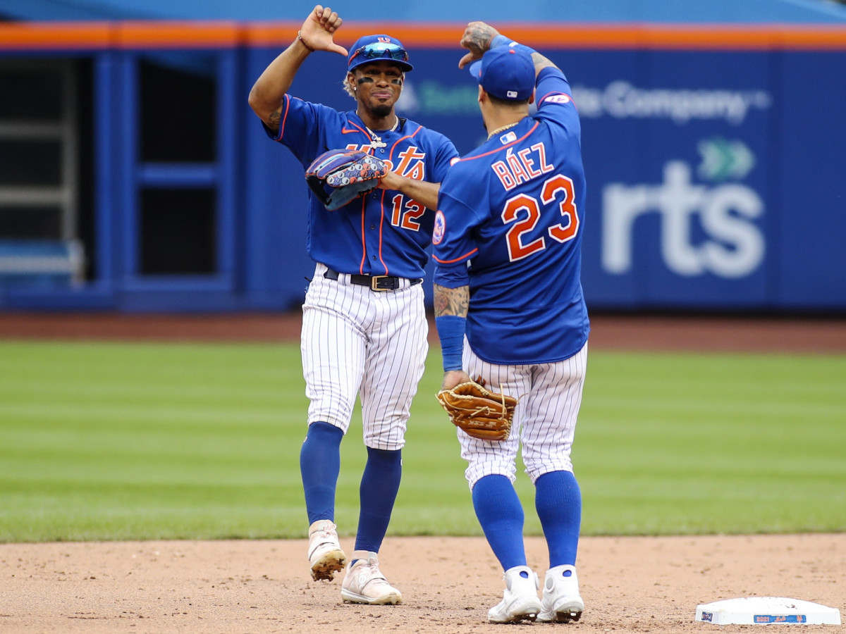 Aug 29, 2021; New York City, New York, USA; New York Mets shortstop Francisco Lindor (12) and second baseman Javier Baez (23) celebrate after defeating the Washington Nationals 9-4 at Citi Field.