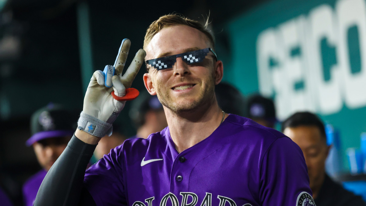 Aug 30, 2021; Arlington, Texas, USA; Colorado Rockies shortstop Trevor Story (27) celebrates after hitting a home run during the seventh inning against the Texas Rangers at Globe Life Field.
