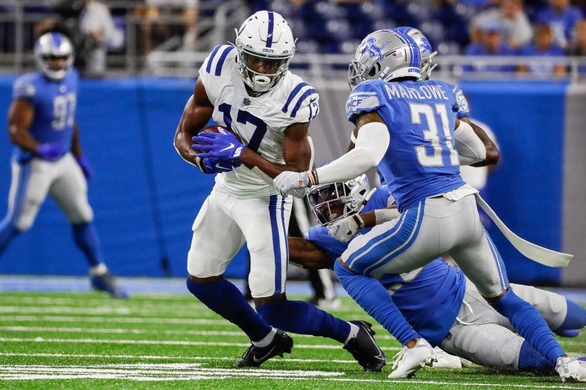 Detroit Lions safety Dean Marlowe (31) defends Indianapolis Colts wide receiver Mike Strachan (17) during the first half of a preseason game at Ford Field in Detroit on Friday, Aug. 27, 2021.