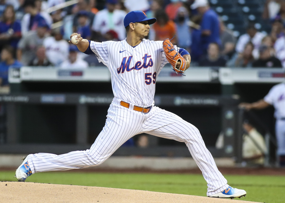 Sep 2, 2021; New York City, New York, USA; New York Mets pitcher Carlos Carrasco (59) pitches in the first inning against the Miami Marlins at Citi Field.