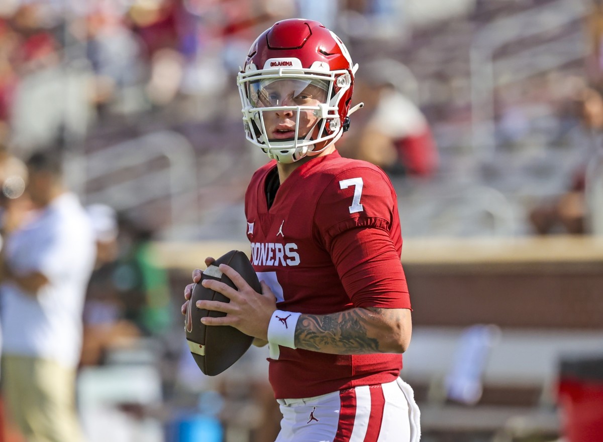 Oklahoma Sooners quarterback Spencer Rattler (7) warms up before the game against the Tulane Green Wave at Gaylord Family-Oklahoma Memorial Stadium.