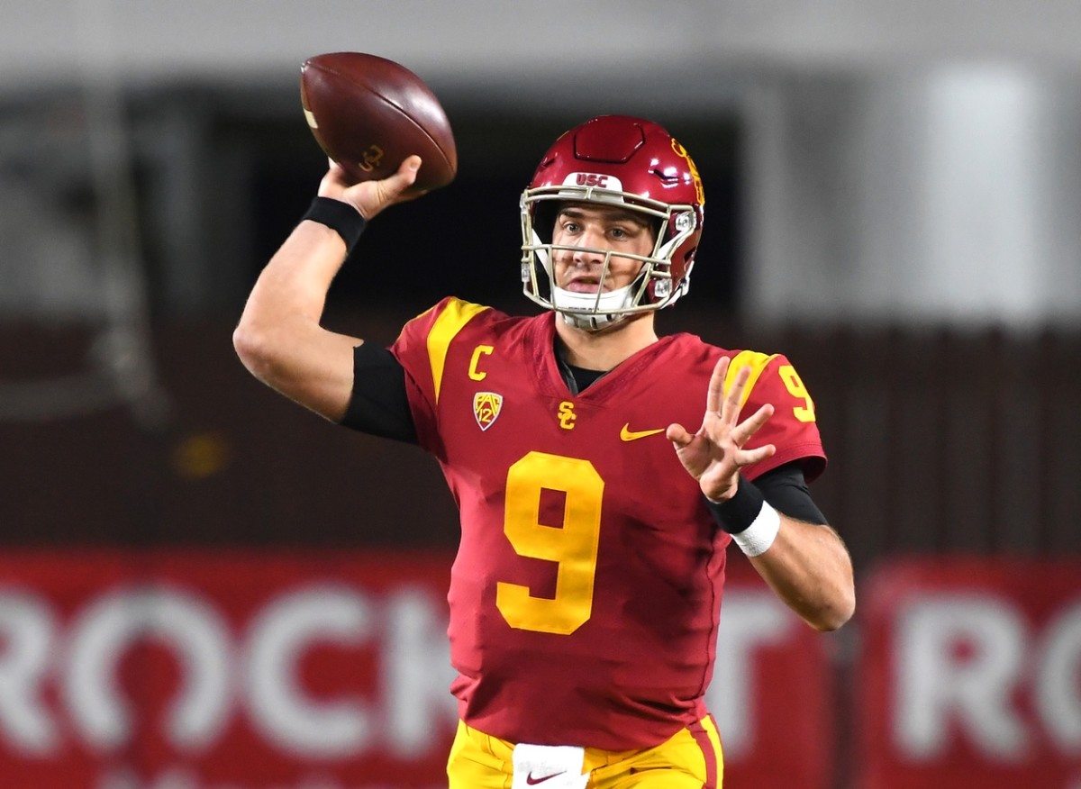 USC Trojans quarterback Kedon Slovis (9) throws a complete pass in the first half of the game against the Washington State Cougars at United Airlines Field at the Los Angeles Memorial Coliseum.