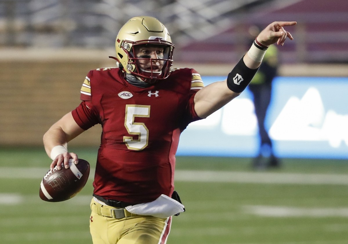 Boston College Eagles quarterback Phil Jurkovec (5) directs his receivers during the first half against the Louisville Cardinals at Alumni Stadium.