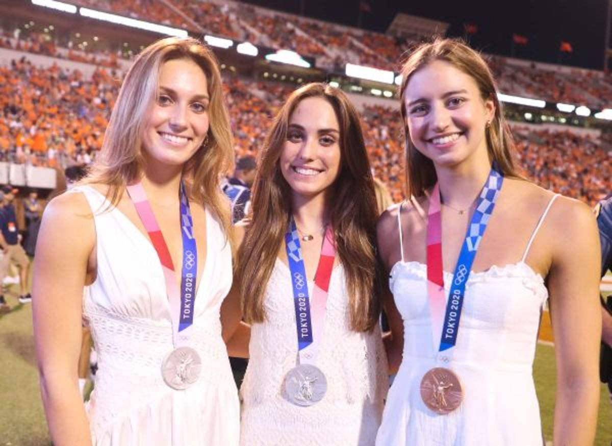 UVA swimmers and Team USA Olympic medalists Alex Walsh, Emma Weyant, and Katie Douglas