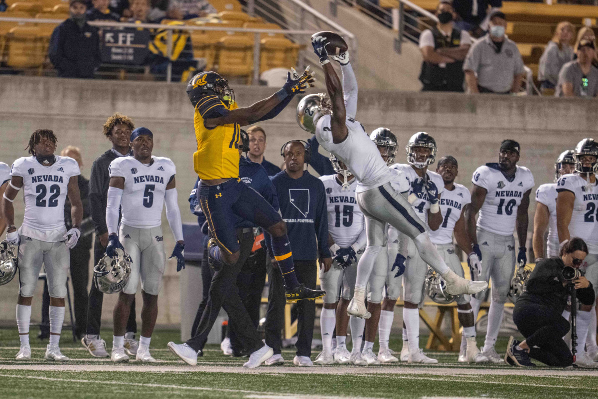 Nevada cornerback Isaiah Essissima (2) intercepts a pass intended for Cal wide receiver Jeremiah Hunter (10).