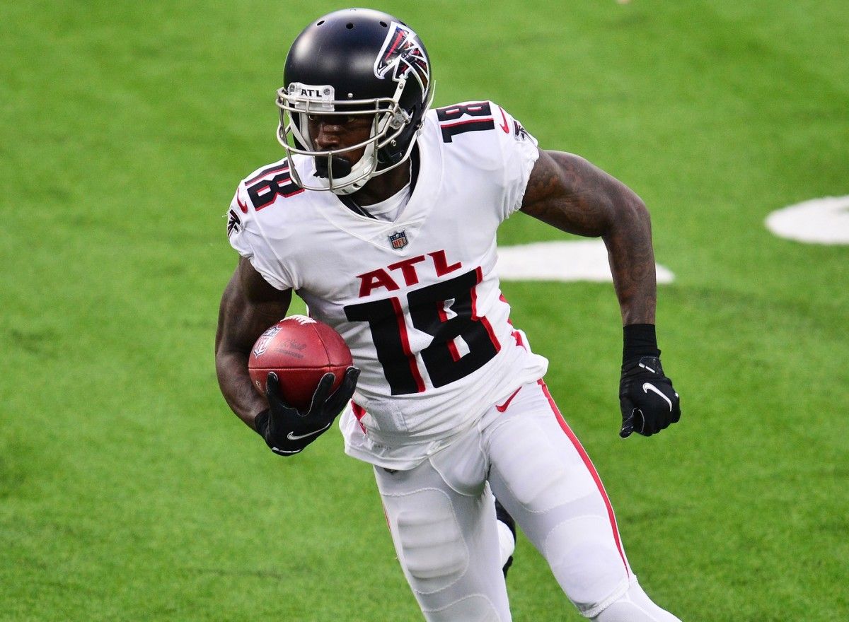 Atlanta Falcons wide receiver Calvin Ridley (18) runs the ball against the Los Angeles Chargers during the first half at SoFi Stadium.