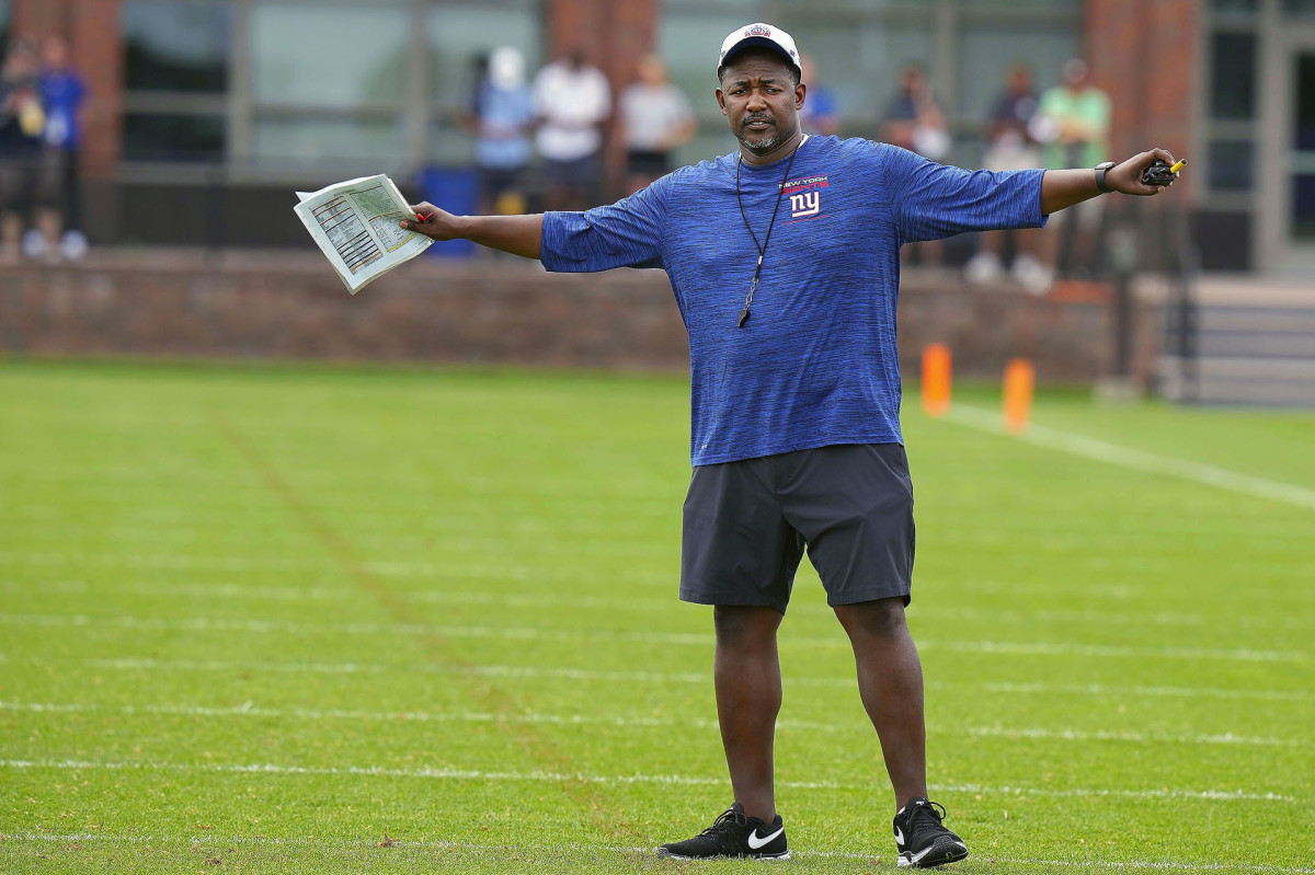 Giants defensive coordinator Patrick Graham signals to his team during training camp