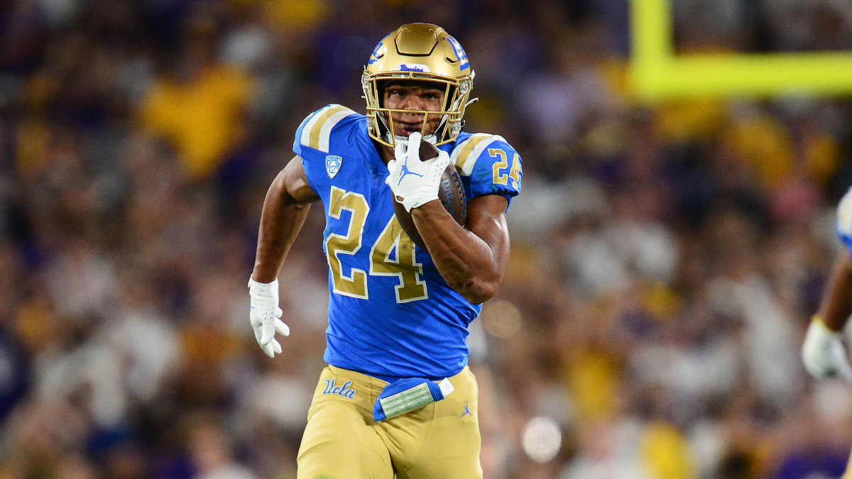 UCLA running back Zach Charbonnet runs the ball against LSU