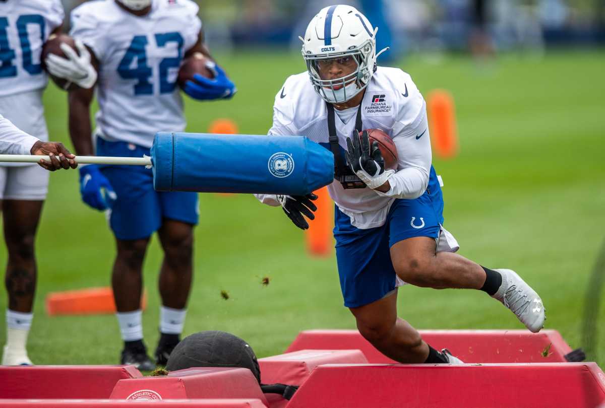 Indianapolis Colts running back Jonathan Taylor (28) carries the ball during a drill Saturday, July 31, 2021.