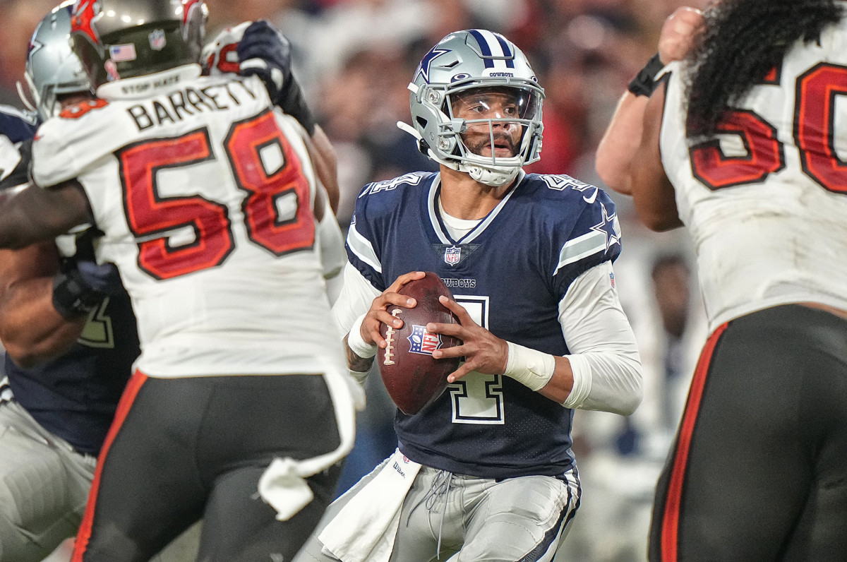 Dak Prescott looks downfield during a season-opening game against the Buccaneers