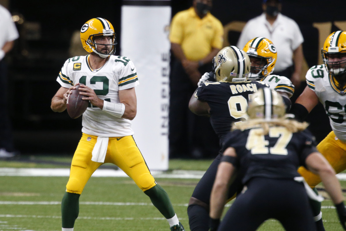 Green Bay Packers quarterback Aaron Rodgers looks to pass against the New Orleans Saints. Credit: Washington Post