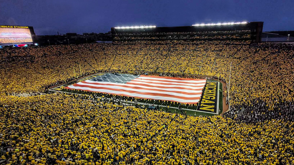 michigan football stadium the big house maize out american flag
