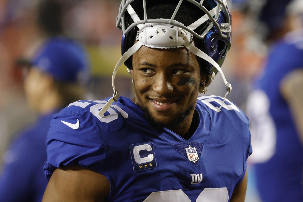 Sep 16, 2021; Landover, Maryland, USA; New York Giants running back Saquon Barkley (26) stands on the field during warmups prior to the Giants' game against the Washington Football Team at FedExField.