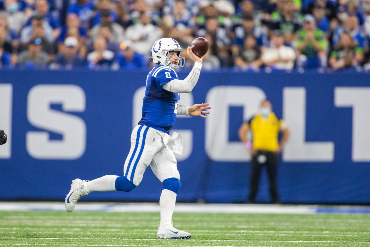 Sep 12, 2021; Indianapolis, Indiana, USA; Indianapolis Colts quarterback Carson Wentz (2) passes the ball in the second quarter against the Seattle Seahawks at Lucas Oil Stadium.