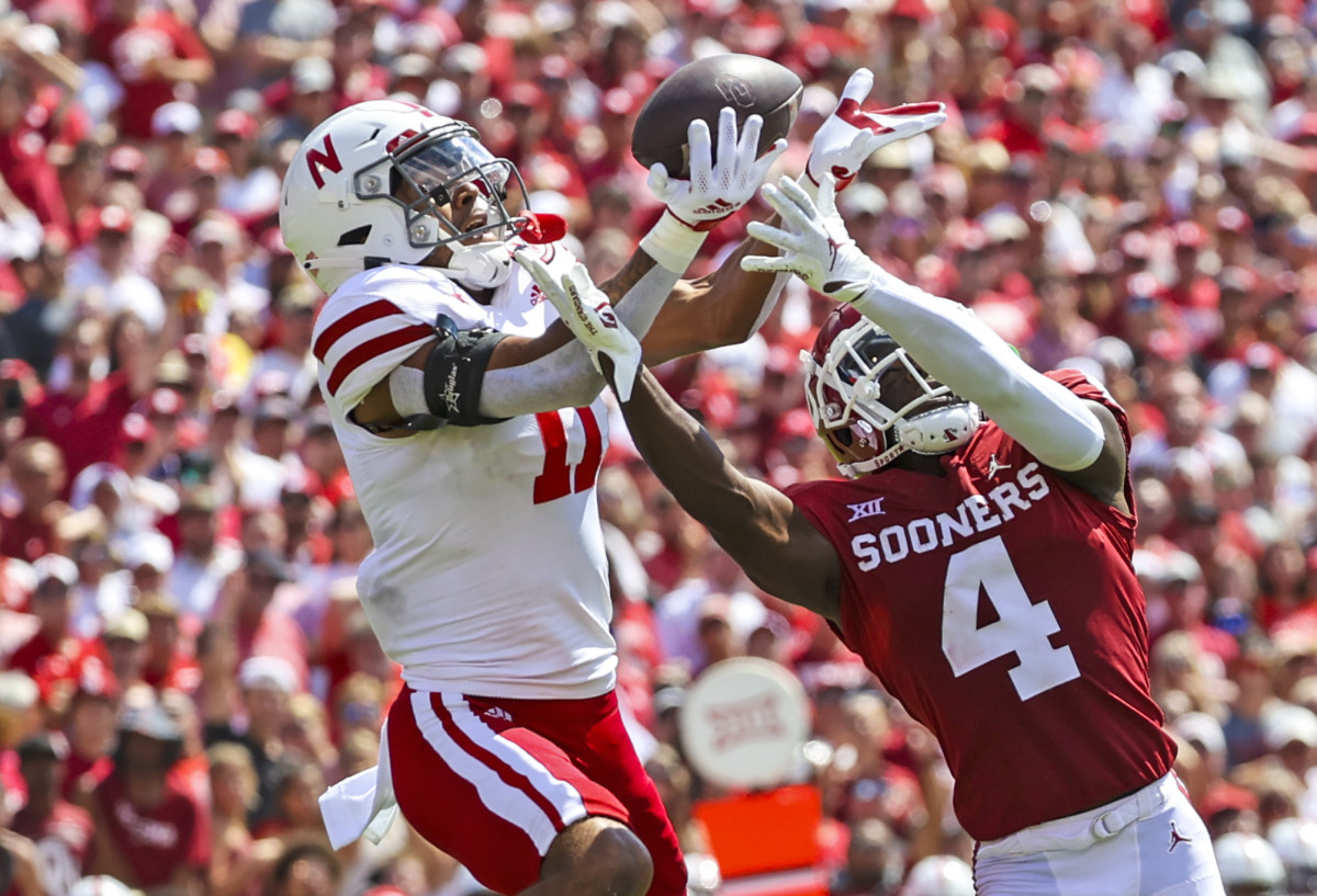 Sep 18, 2021; Norman, Oklahoma, USA; Nebraska Cornhuskers cornerback Braxton Clark (11) breaks up a pass intended for Oklahoma Sooners wide receiver Mario Williams (4) during the fourth quarter at Gaylord Family-Oklahoma Memorial Stadium.