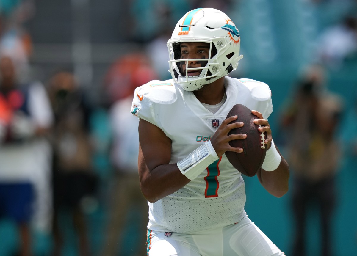 Sep 19, 2021; Miami Gardens, Florida, USA; Miami Dolphins quarterback Tua Tagovailoa (1) attempts a pass against the Buffalo Bills during the first half at Hard Rock Stadium.