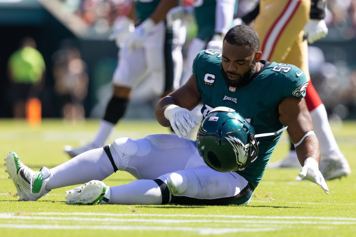 Sep 19, 2021; Philadelphia, Pennsylvania, USA; Philadelphia Eagles defensive end Brandon Graham (55) takes off his helmet after being injured during the second quarter against the San Francisco 49ers at Lincoln Financial Field.