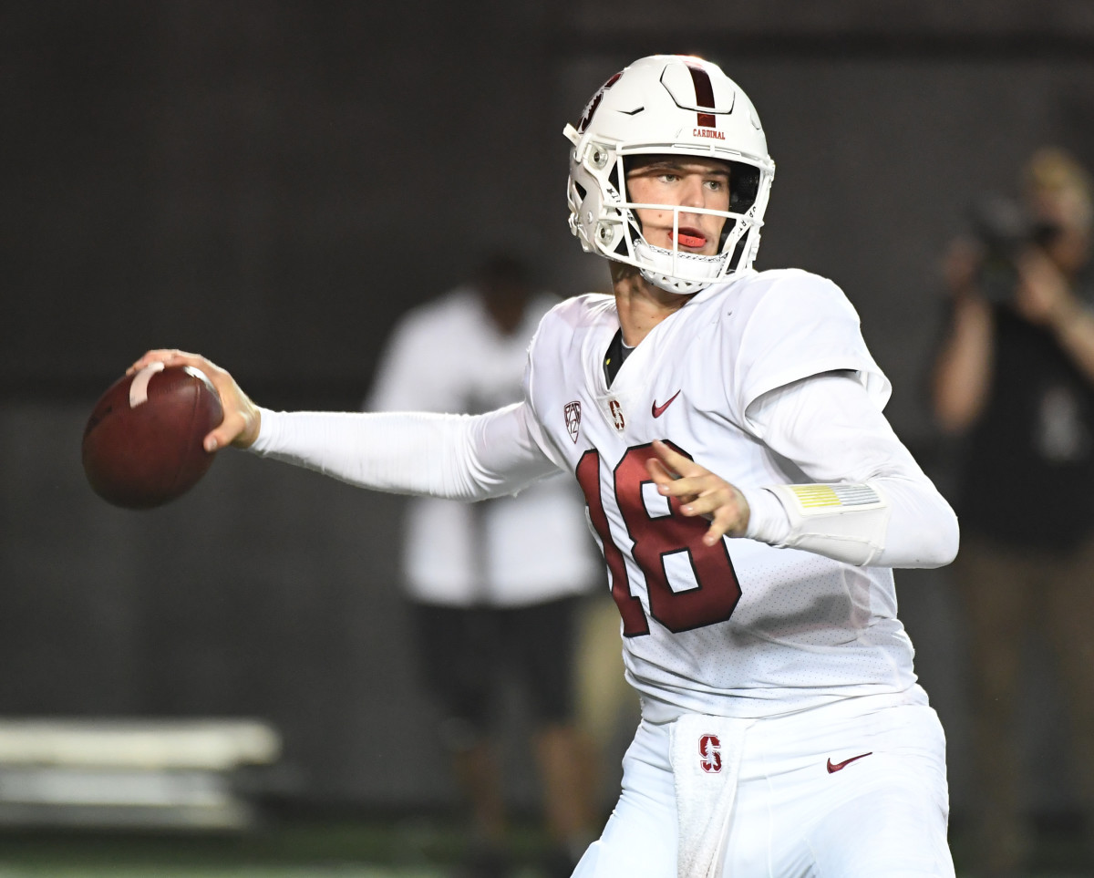 Stanford Cardinal quarterback Tanner McKee (18) attempts a pass.