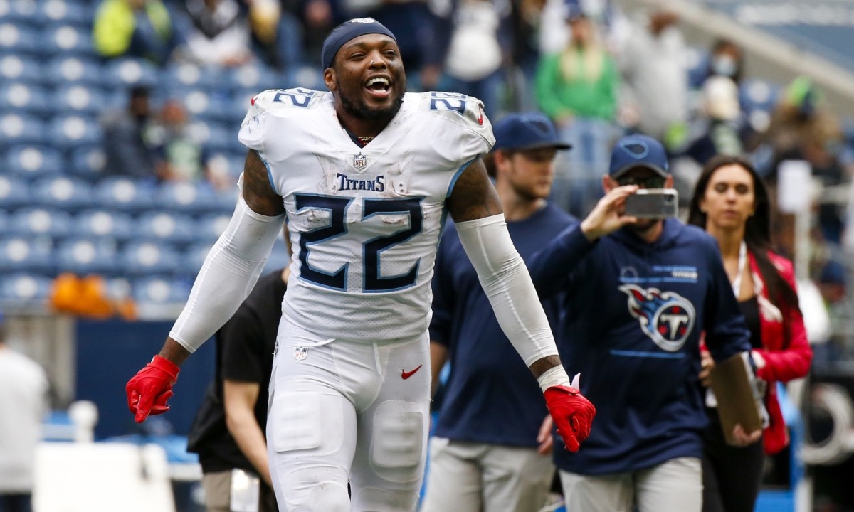 Tennessee Titans running back Derrick Henry (22) celebrates following a 33-30 overtime victory against the Seattle Seahawks at Lumen Field.