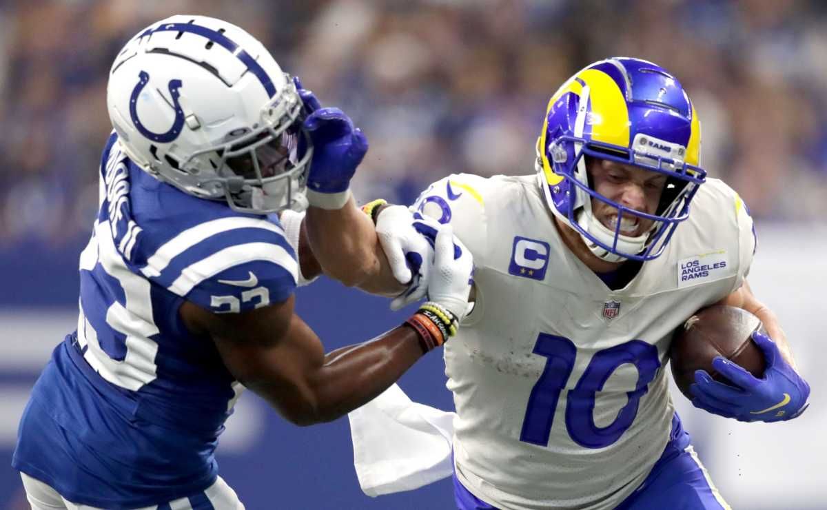 Indianapolis Colts cornerback Kenny Moore II (23) is stiff armed by Los Angeles Rams wide receiver Cooper Kupp (10) as he works to bring him down along the sideline Sunday, Sept. 19, 2021, during a game against the Los Angeles Rams at Lucas Oil Stadium in Indianapolis.