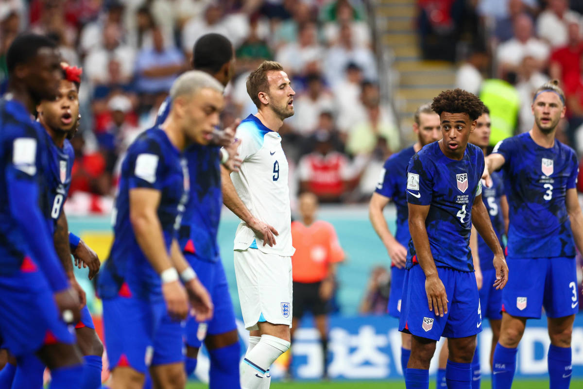England captain Harry Kane pictured (center) surrounded by USA players during a game at the 2022 FIFA World Cup in Qatar