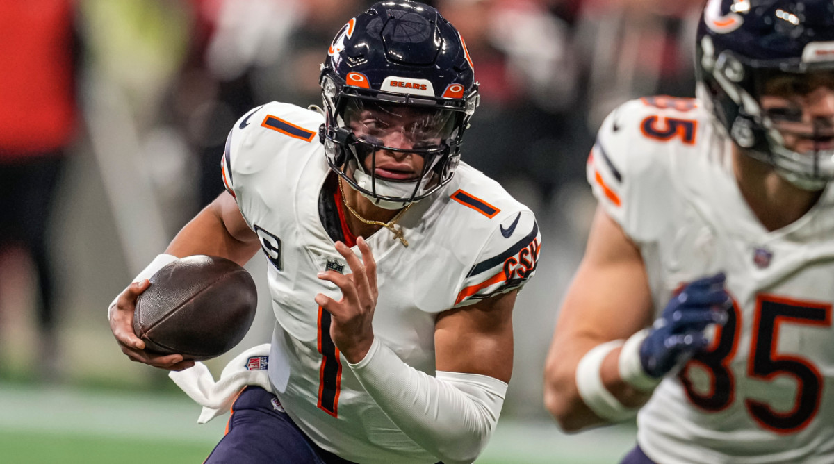 Nov 20, 2022; Atlanta, Georgia, USA; Chicago Bears quarterback Justin Fields (1) runs with the ball against the Atlanta Falcons during the first quarter at Mercedes-Benz Stadium. Mandatory Credit: Dale Zanine-USA TODAY Sports