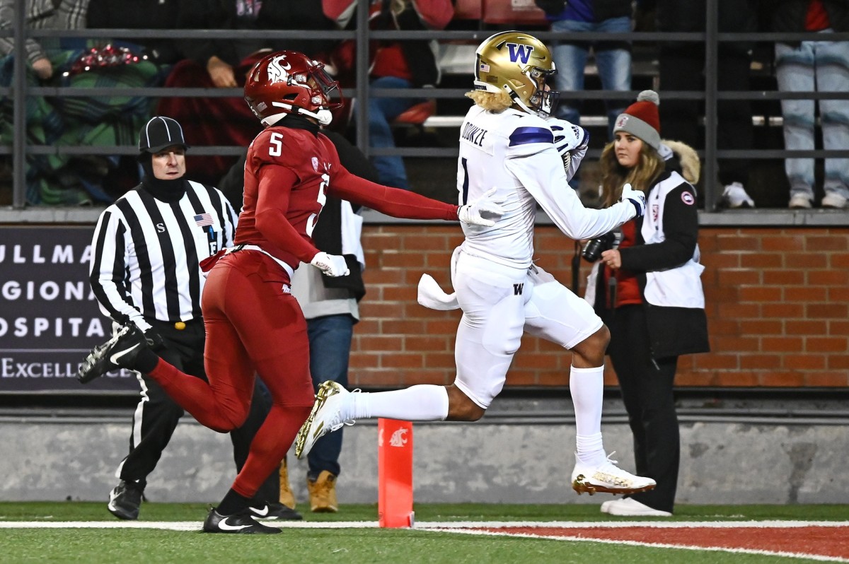 Rome Odunze scores on a 47-yard touchdown pass in the Apple Cup.