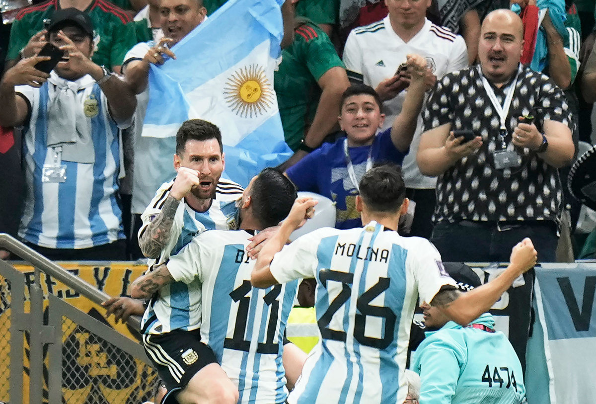 Lionel Messi celebrates his goal against Mexico