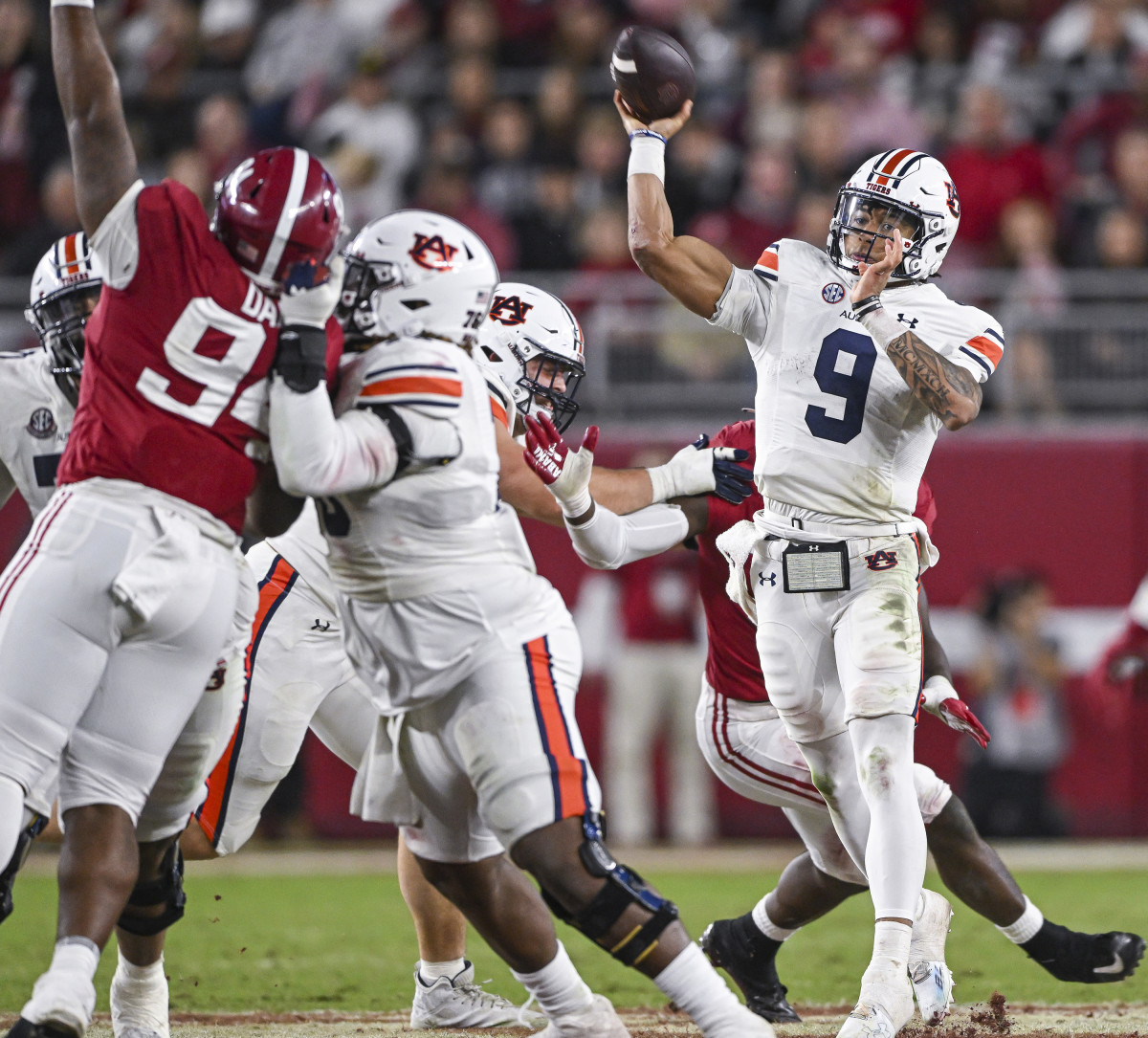 Robby Ashford (9) throws the ball deep during the game between Auburn and Alabama at Bryant-Denny Stadium. Todd Van Emst/AU Athletics