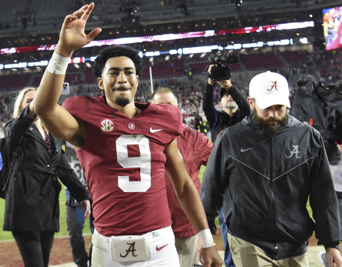 Alabama Crimson Tide quarterback Bryce Young (9) waves to fans as he leaves the field after defeating the Auburn Tigers at Bryant-Denny Stadium. Alabama won 49-27.