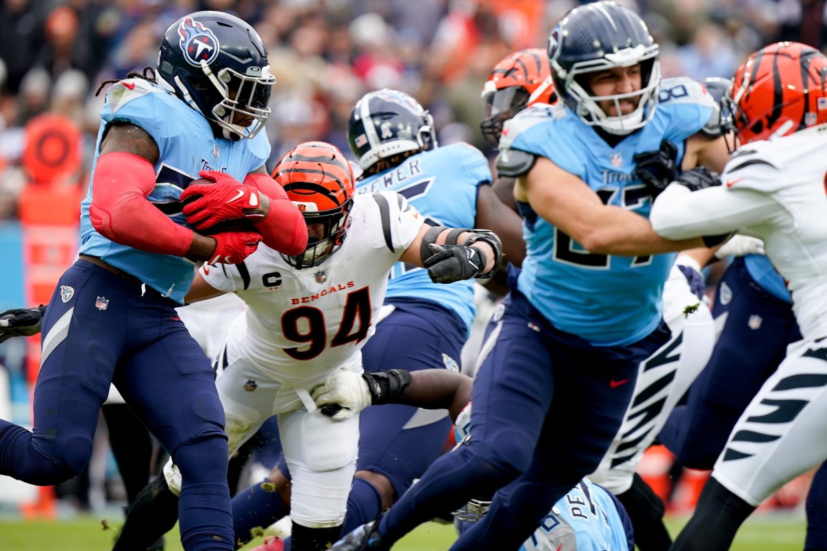 Tennessee Titans running back Derrick Henry (22) carries the ball as they face the Cincinnati Bengals during the second quarter at Nissan Stadium Sunday, Nov. 27, 2022, in Nashville, Tenn. Nfl Cincinnati Bengals At Tennessee Titans Syndication The Tennessean