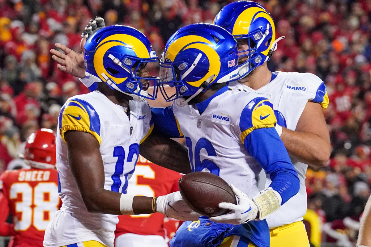 Los Angeles Rams wide receiver Van Jefferson (12) celebrates with quarterback Bryce Perkins (16) after scoring against the Kansas City Chiefs during the second half at GEHA Field at Arrowhead Stadium