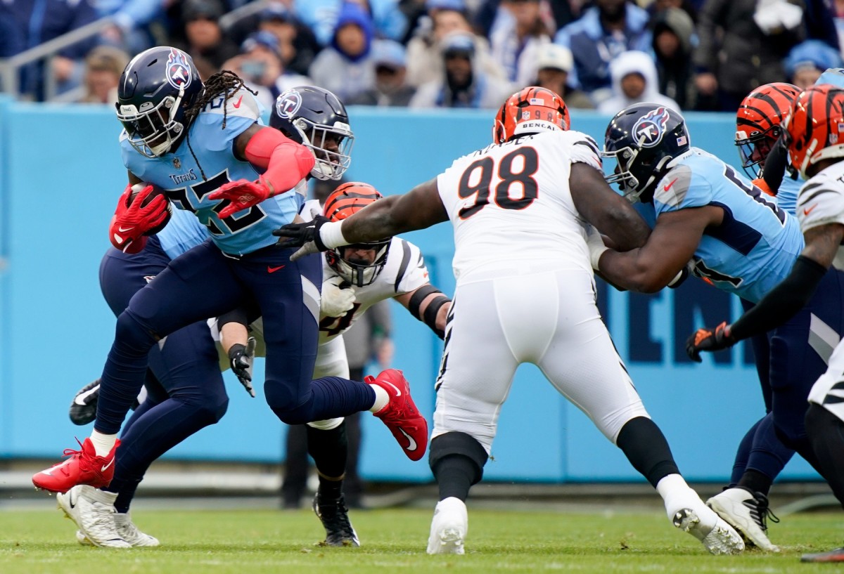 Tennessee Titans running back Derrick Henry (22) runs the ball during the first quarter as they face the Cincinnati Bengals at Nissan Stadium Sunday, Nov. 27, 2022, in Nashville, Tenn. Nfl Cincinnati Bengals At Tennessee Titans