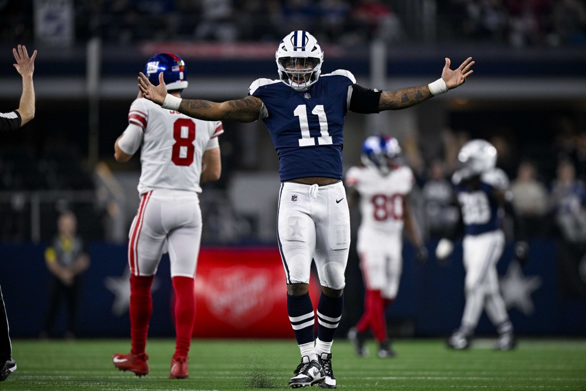 Nov 24, 2022; Arlington, Texas, USA; Dallas Cowboys linebacker Micah Parsons (11) celebrates after he sacks New York Giants quarterback Daniel Jones (8) during the second half of the game between the Cowboys and the Giants at AT&T Stadium.
