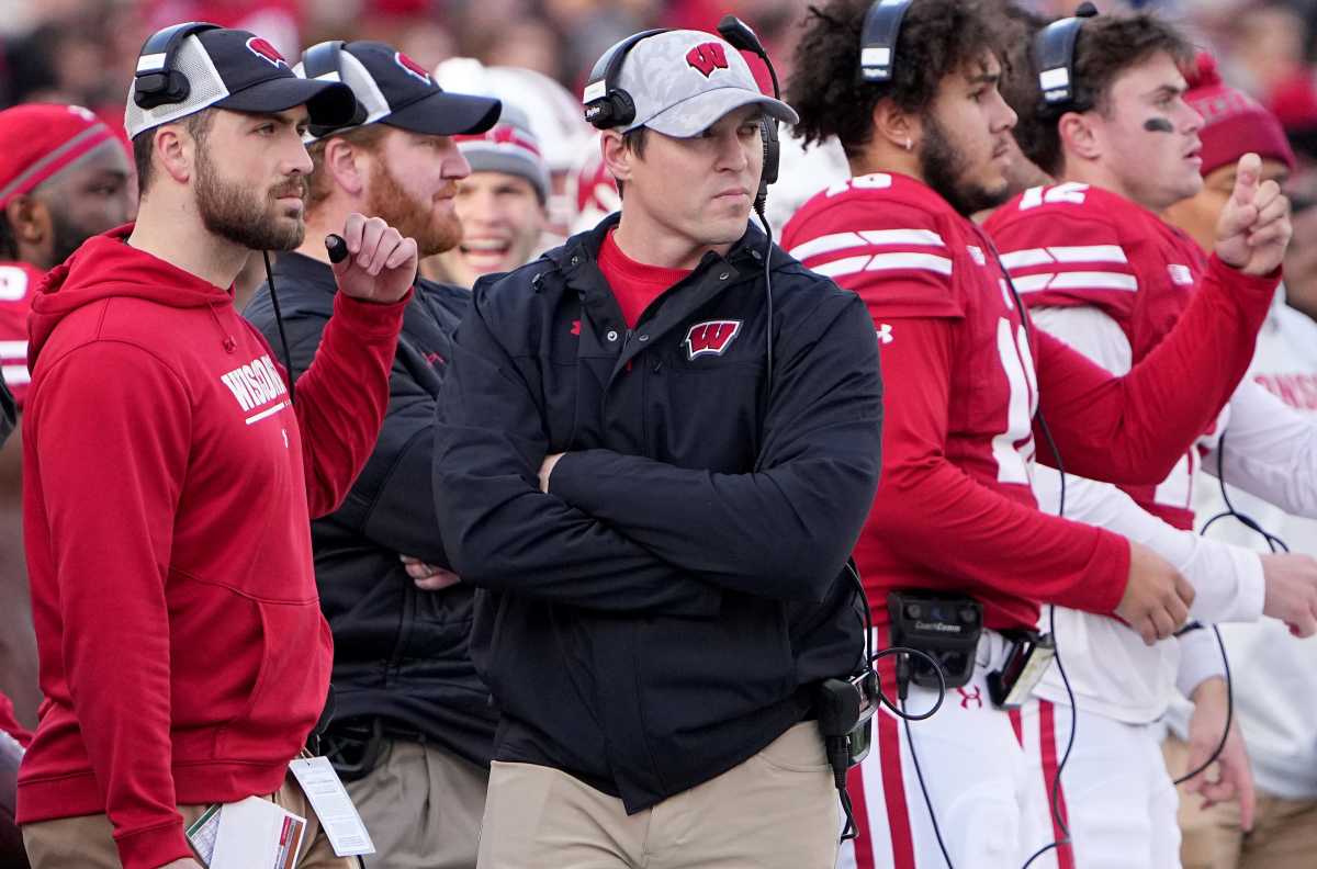 Wisconsin head coach Jim Leonhard, center, is shown during the first quarter of their game Saturday, November 26, 2022 at Camp Randall Stadium in Madison, Wis. Uwgrid26 5
