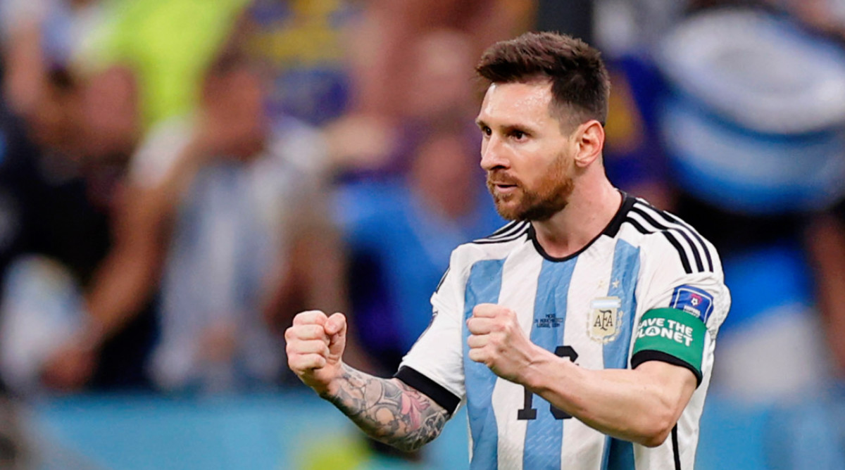 Argentina forward Lionel Messi celebrates after scoring a goal against Mexico at the 2022 men’s World Cup.