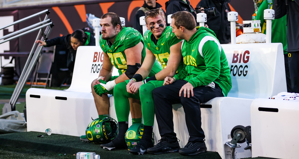 Alex Forsyth, Bo Nix and former Oregon offensive coordinator Kenny Dillingham after a loss to Oregon State.