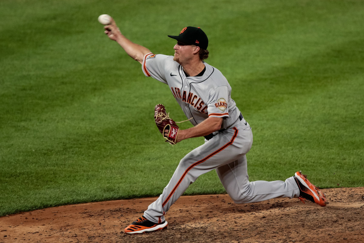 SF Giants relief pitcher Trevor Gott pitches in the ninth inning against the Colorado Rockies. (2020)