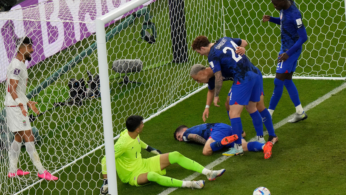Christian Pulisic in the Iran goal after scoring to give the U.S. the lead