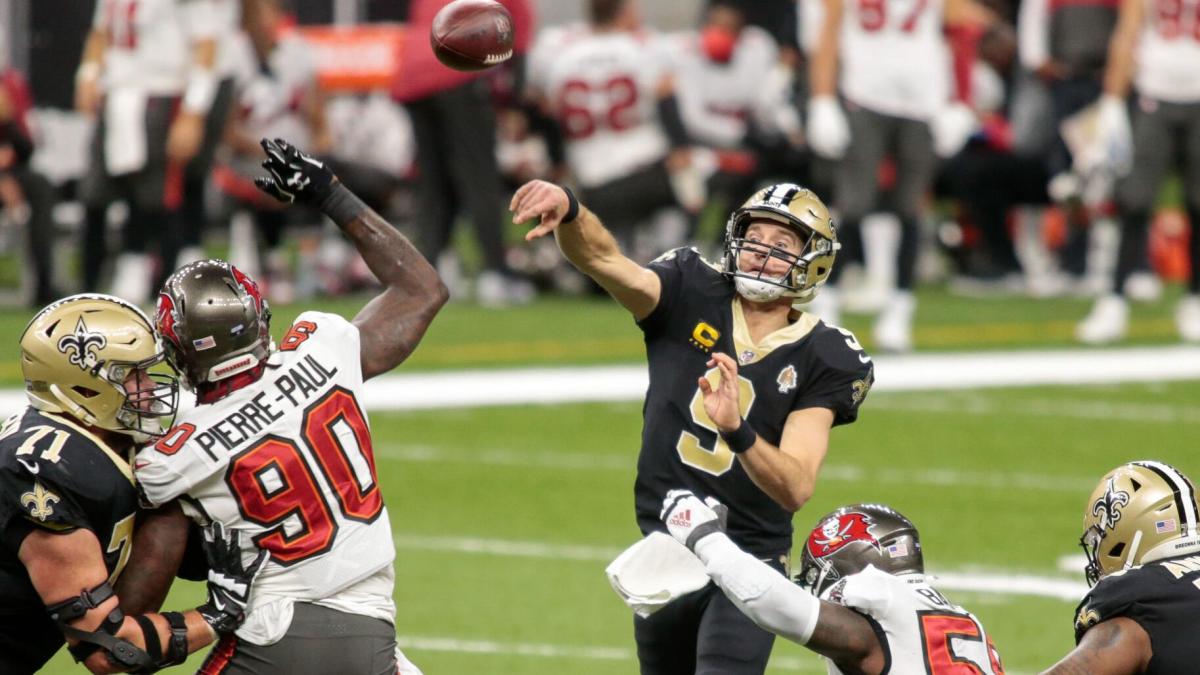 Saints QB Drew Brees throws against the Tampa Bay Buccaneers in a 2021 Divisional Playoff game. Credit: NOLA.com