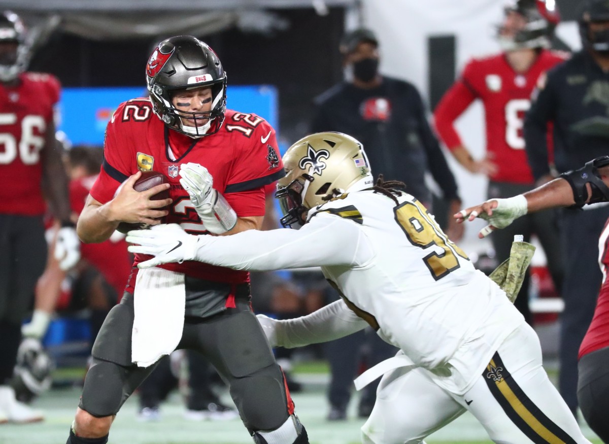 Nov 8, 2020; New Orleans Saints defensive tackle Malcom Brown (90) sacks Tampa Bay Buccaneers quarterback Tom Brady (12). Mandatory Credit: Kim Klement-USA TODAY Sports