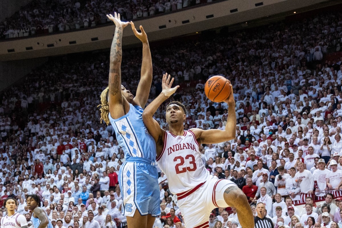 Indiana Hoosiers forward Trayce Jackson-Davis (23) shoots the ball while North Carolina Tar Heels forward Armando Bacot (5) defends in the first half at Simon Skjodt Assembly Hall.