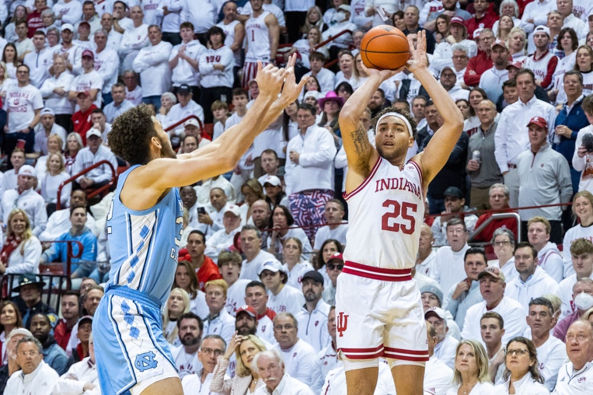 Indiana Hoosiers forward Race Thompson (25) shoots the ball while North Carolina Tar Heels forward Pete Nance (32) defends in the first half.