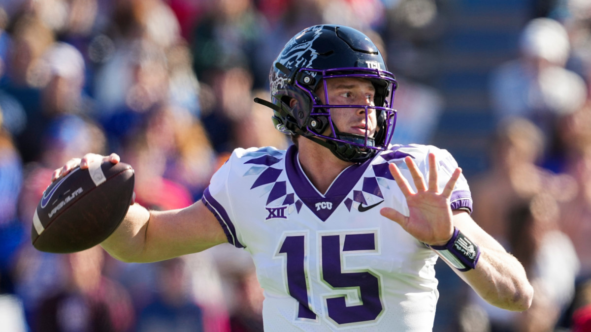 Oct 8, 2022; Lawrence, Kansas, USA; TCU Horned Frogs quarterback Max Duggan (15) throws a pass during the first half against the Kansas Jayhawks at David Booth Kansas Memorial Stadium.