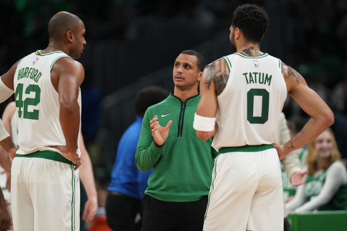 Nov 30, 2022; Boston, Massachusetts, USA; Boston Celtics head coach Joe Mazzulla talks with forward Jayson Tatum (0) and center Al Horford (42) from the sideline as they take on the Miami Heat at TD Garden.