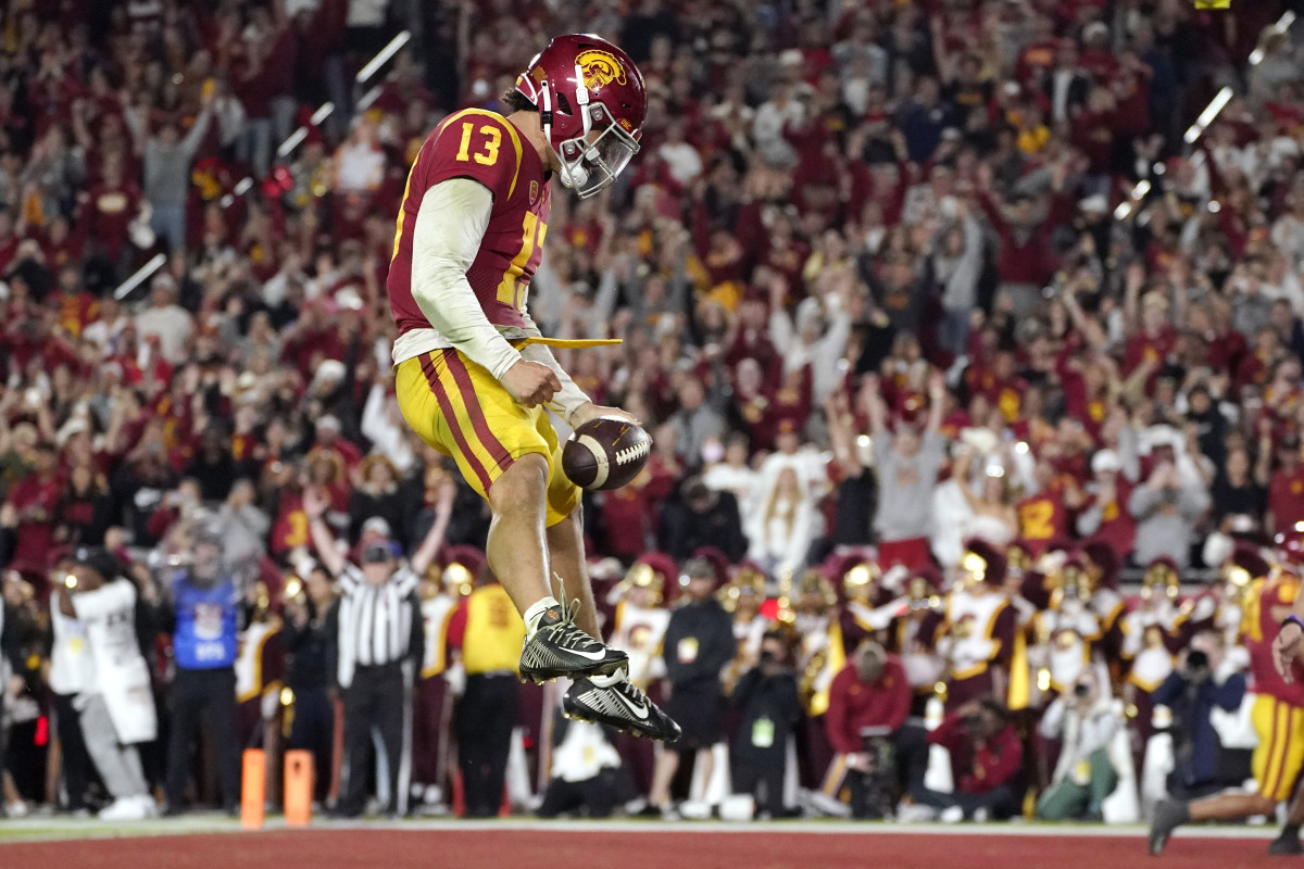 Southern California quarterback Caleb Williams celebrates after running in for a touchdown during the first half of an NCAA college football game against Notre Dame Saturday, Nov. 26, 2022, in Los Angeles.
