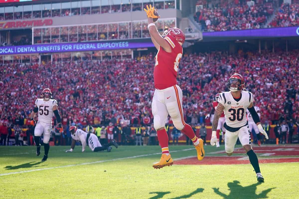 Kansas City Chiefs tight end Travis Kelce (87) catches a touchdown as Cincinnati Bengals free safety Jessie Bates (30) defends in the second quarter during the AFC championship NFL football game, Sunday, Jan. 30, 2022, at GEHA Field at Arrowhead Stadium in Kansas City, Mo. Cincinnati Bengals At Kansas City Chiefs Jan 30 Afc Championship 220