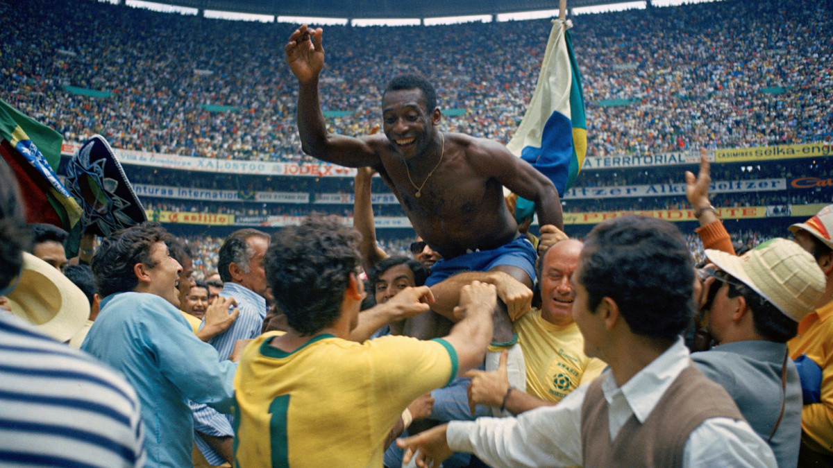 Pelé is lifted in celebration after Brazil’s 1970 World Cup triumph